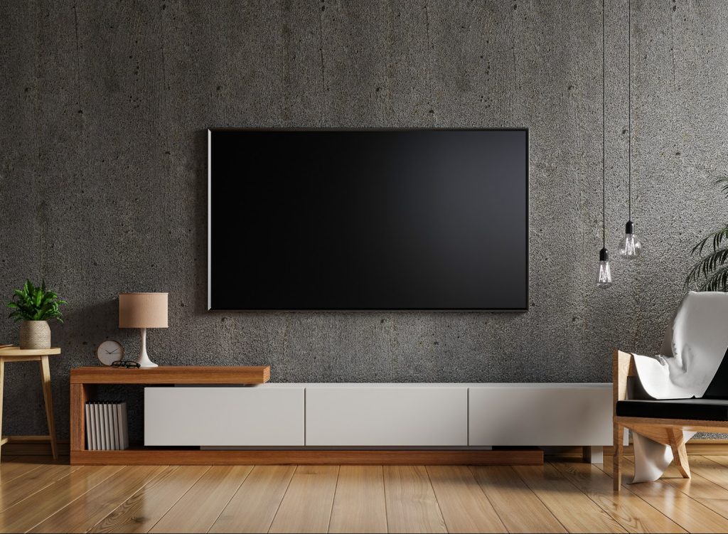 Tv mockup on cabinet in living room.